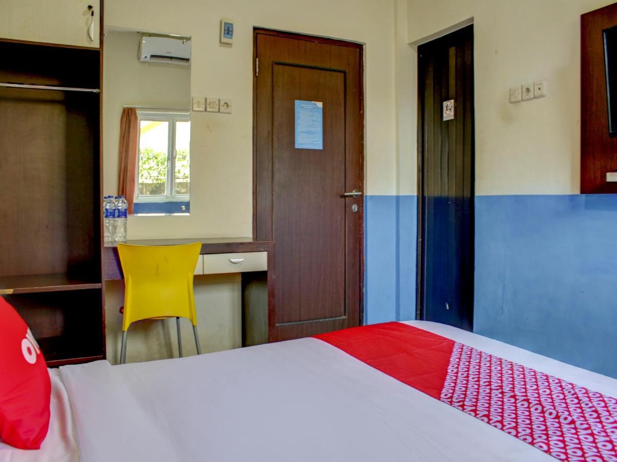 Oyo 90162 Remboelan Guest House Sungai Lutus Exterior foto
